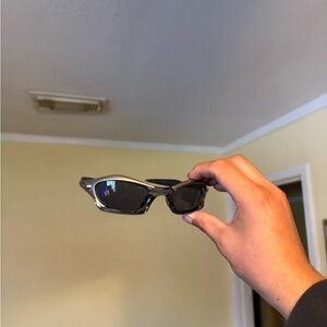Black Sunglasses with Dark Lenses Oakley Oakleys